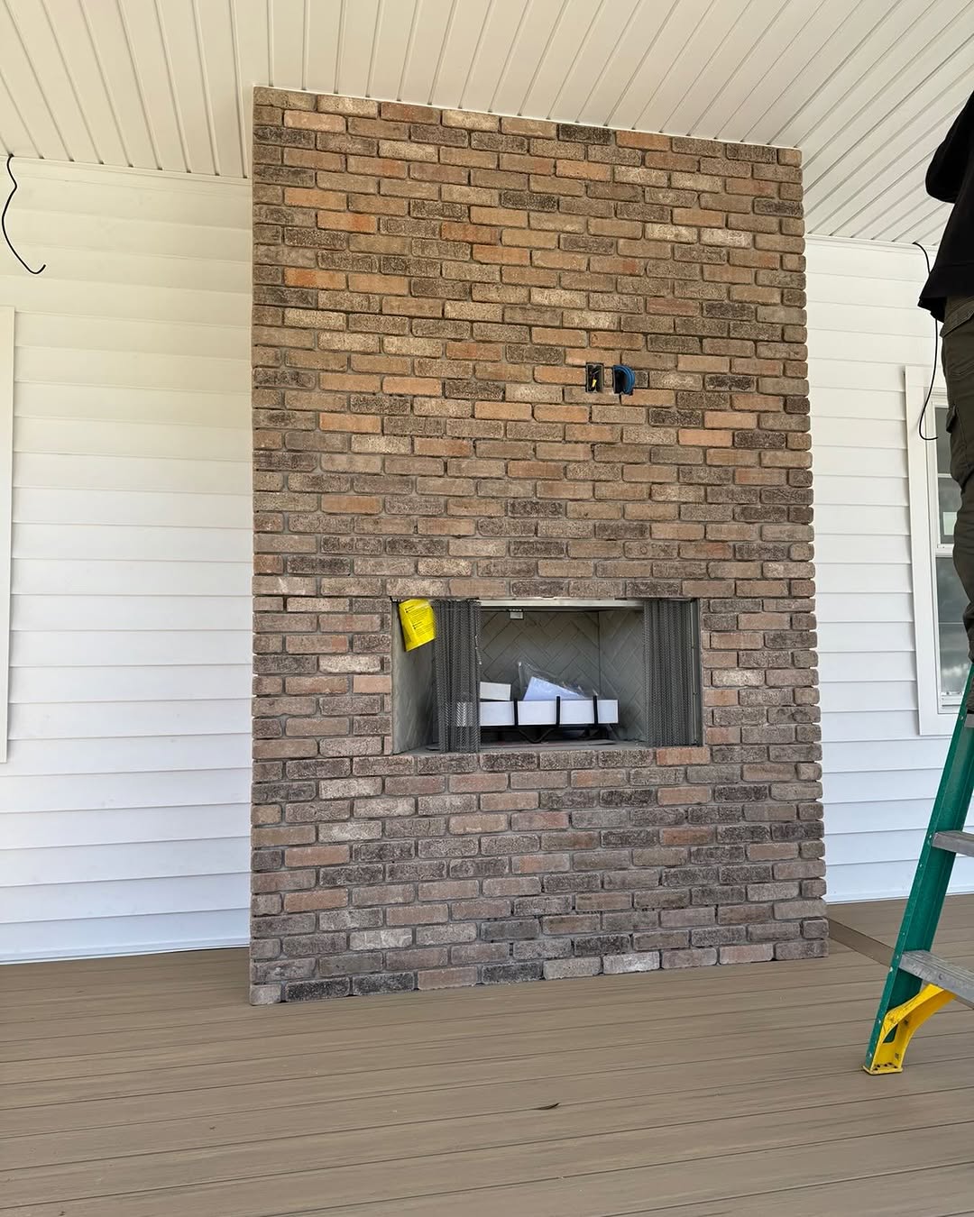 Brick fireplace in progress